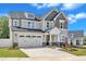 Charming two-story home with a manicured lawn and an attached two-car garage in a desirable neighborhood at 9113 Dupree Meadow Dr # 41, Angier, NC 27501