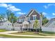 Beautiful two-story home with a well-kept lawn and an attached two-car garage in a friendly neighborhood at 9113 Dupree Meadow Dr # 41, Angier, NC 27501