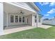 Covered patio area featuring an outdoor ceiling fan, ideal for relaxing and enjoying the outdoor scenery at 9113 Dupree Meadow Dr # 41, Angier, NC 27501