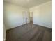 Spacious bedroom with carpeted floors and walk-in closet at 32 Furley St., Homesite 53, Sanford, NC 27330