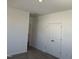 Neutral bedroom featuring carpeted floors and a closet at 32 Furley St., Homesite 53, Sanford, NC 27330