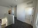 Hallway with multiple doors and carpeted floors at 32 Furley St., Homesite 53, Sanford, NC 27330