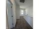Second floor hallway with carpeted floors at 32 Furley St., Homesite 53, Sanford, NC 27330