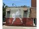 Exterior wall painting featuring a baseball player in action, commemorating Sanford Springers baseball team at 32 Furley St., Homesite 53, Sanford, NC 27330