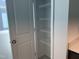 Pantry with white wire shelving and tile floor at 32 Furley St., Homesite 53, Sanford, NC 27330