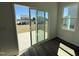 Bright room with sliding glass doors leading to the backyard at 32 Furley St., Homesite 53, Sanford, NC 27330
