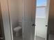 Toilet room with toilet, white walls and tile floor at 32 Furley St., Homesite 53, Sanford, NC 27330
