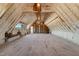 Spacious attic featuring new insulation and natural light, ideal for storage or future conversion to living space at 9009 Meadow Pointe Ct, Wake Forest, NC 27587