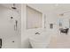 Spa-like bathroom with soaking tub and walk-in shower at 9009 Meadow Pointe Ct, Wake Forest, NC 27587