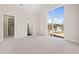 Bright bedroom with large window, walk-in closet, and ensuite bath at 9009 Meadow Pointe Ct, Wake Forest, NC 27587