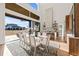 Bright dining area with a view and seating for six at 9009 Meadow Pointe Ct, Wake Forest, NC 27587