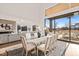 Elegant dining area with large windows and access to patio at 9009 Meadow Pointe Ct, Wake Forest, NC 27587