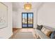 Bright and airy foyer with hardwood floors and a bench at 9009 Meadow Pointe Ct, Wake Forest, NC 27587