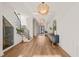 Elegant foyer with hardwood floors, a staircase, and a console table at 9009 Meadow Pointe Ct, Wake Forest, NC 27587