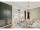 Bright home office features built-in shelving and cabinets at 9009 Meadow Pointe Ct, Wake Forest, NC 27587