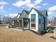 Modern home with large windows and a covered patio at 9009 Meadow Pointe Ct, Wake Forest, NC 27587