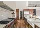 Luxury kitchen with stainless steel appliances and wood cabinets at 9009 Meadow Pointe Ct, Wake Forest, NC 27587