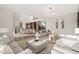 Open living area showcasing a seamless transition to kitchen and dining at 9009 Meadow Pointe Ct, Wake Forest, NC 27587
