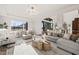 Spacious living room with ample seating and views of backyard at 9009 Meadow Pointe Ct, Wake Forest, NC 27587