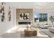 Living room boasts modern fireplace and large windows at 9009 Meadow Pointe Ct, Wake Forest, NC 27587
