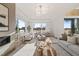 Living room with fireplace, large windows, and open floor plan at 9009 Meadow Pointe Ct, Wake Forest, NC 27587