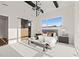Main bedroom with sliding barn door, plush bedding, and a view at 9009 Meadow Pointe Ct, Wake Forest, NC 27587