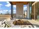 Relaxing outdoor patio with seating area, fireplace, and tranquil views at 9009 Meadow Pointe Ct, Wake Forest, NC 27587