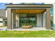 Covered patio with modern design and comfortable outdoor seating, ideal for relaxing and enjoying the beautiful outdoor scenery at 9009 Meadow Pointe Ct, Wake Forest, NC 27587