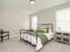 Cozy bedroom with natural light, plush carpet and stylish furniture at 1721 Grassy Falls Ln, Wendell, NC 27591