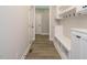 Well-organized hallway boasts built-in storage and easy access to nearby rooms at 1721 Grassy Falls Ln, Wendell, NC 27591