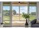 Inviting living room showcasing sliding glass doors to outdoor views and letting in natural light at 110 Summerlin Dr, Clayton, NC 27527
