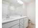 Bright bathroom with double vanity, modern fixtures, framed mirror and a shower-tub combination at 73 Artic Cir, Garner, NC 27529