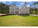 Charming two-story home with a manicured lawn and inviting curb appeal at 73 Artic Cir, Garner, NC 27529