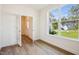 Office with glass french doors and large window overlooking the front yard at 73 Artic Cir, Garner, NC 27529
