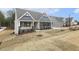 Gray siding, stone accents, and a front porch at 115 Ironwood Blvd # 51, Youngsville, NC 27596