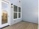 Spacious wooden deck with access to the house at 1156 Cottonsprings Dr, Wendell, NC 27591