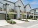 Stylish townhomes featuring private balconies and attached garages with well manicured landscaping at 1156 Cottonsprings Dr, Wendell, NC 27591