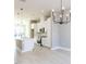 Open-concept kitchen with stainless steel appliances and island sink at 1156 Cottonsprings Dr, Wendell, NC 27591