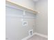 Laundry room with white walls, tile floor, and connections for a washer and dryer at 1156 Cottonsprings Dr, Wendell, NC 27591