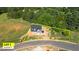 Aerial view of new construction home on lot one in a treed neighborhood at 3402 St Barts Pl, Mebane, NC 27302