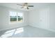 Unfurnished bedroom offers ample natural light through a large window at 3402 St Barts Pl, Mebane, NC 27302