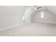 Spacious room featuring vaulted ceilings, natural light, and plush carpeting at 3402 St Barts Pl, Mebane, NC 27302