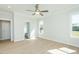 Bright bedroom featuring natural light and neutral decor and en-suite bath at 3402 St Barts Pl, Mebane, NC 27302
