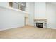 Bright, open living room featuring a soaring ceiling and a charming stone fireplace at 3402 St Barts Pl, Mebane, NC 27302