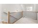 Loft area featuring modern railings and a stylish chandelier at 3402 St Barts Pl, Mebane, NC 27302