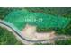 Aerial view of property Lot 28-29 surrounded by lush greenery, illustrating the landscape and potential building site at 316 Firefly Overlook, Pittsboro, NC 27312