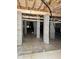 Unfinished basement featuring support columns and utilities, ready to be converted into living space at 316 Firefly Overlook, Pittsboro, NC 27312