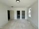 Bright bedroom with closets and doorway leading to an ensuite bath at 316 Firefly Overlook, Pittsboro, NC 27312