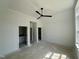 Large bedroom with access to a bathroom and walk-in closet at 316 Firefly Overlook, Pittsboro, NC 27312