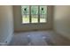 Bright bedroom with large window providing ample natural light at 316 Firefly Overlook, Pittsboro, NC 27312